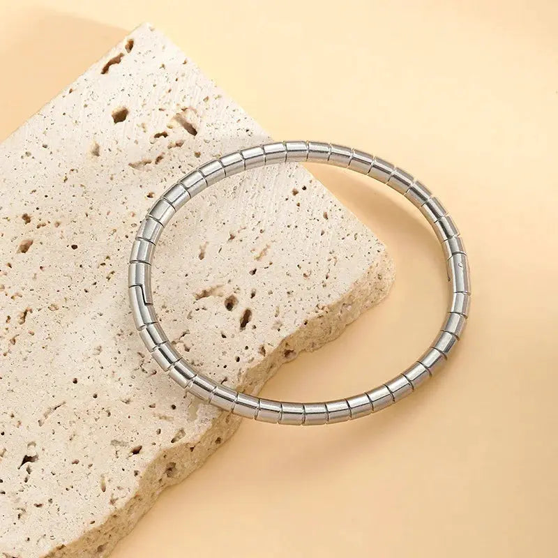 Stainless steel waterproof cuff bracelet for women, silver-tone with smooth segmented bead design