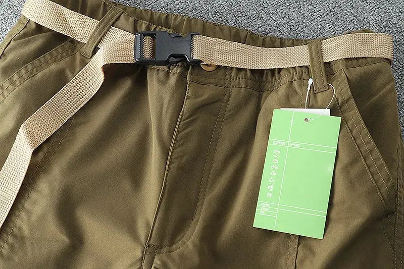 Simples Market Tooling pants: thick waterproof fleece cargo pants in olive, beige belt, tag attached