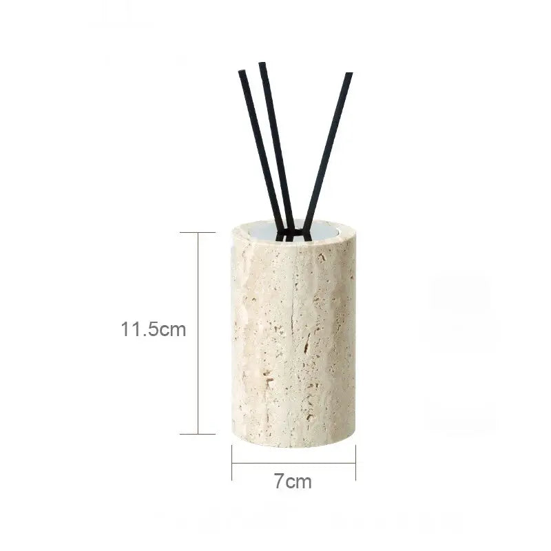 Beige travertine bathroom accessories set by Simples Market with reed diffuser