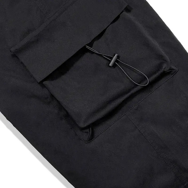 Men's black cargo pants by Simples Market with drawstring pocket and wide-leg fit