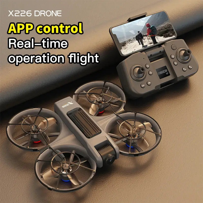 X226 gray drone with four prop guards and handheld remote controller with smartphone mount