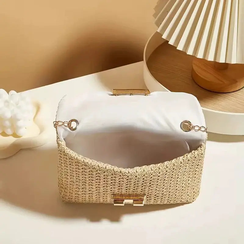 Simples Market crossbody bag woven straw with chain strap, natural beige color, white lining, gold hardware