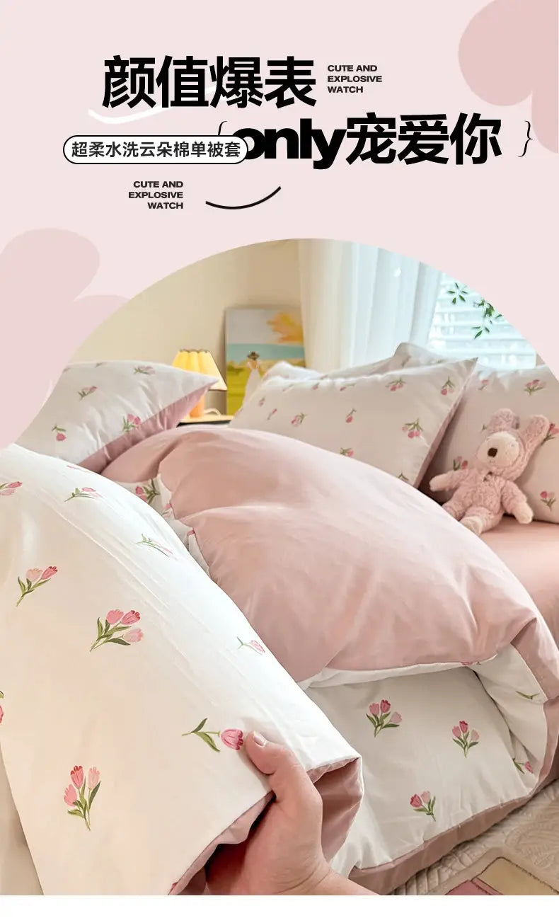 Tulip simple three-piece student bedding set by Simples Market; pink quilt cover with floral white pillowcases.