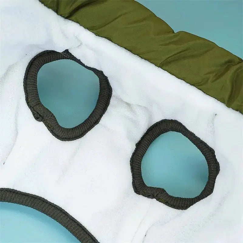Large waterproof dog jacket with harness openings; white fleece interior, green outer fabric