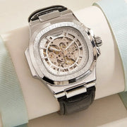 Longlux men's skeleton automatic watch with silver case and black leather strap