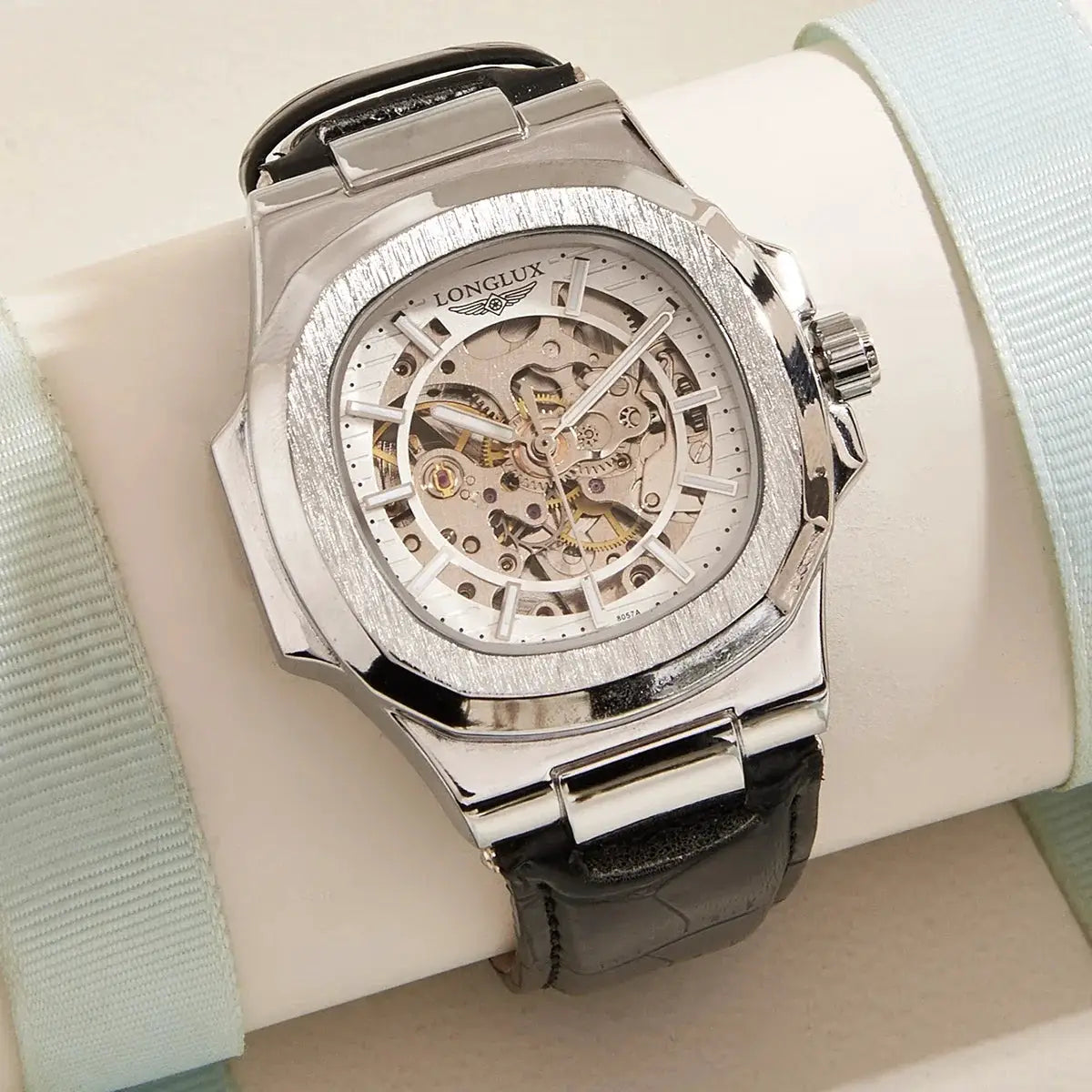 Longlux men's skeleton automatic watch with silver case and black leather strap