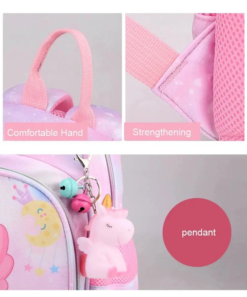 Pink unicorn backpack for girls with cartoon princess print, sturdy handle, padded straps, and unicorn pendant charm