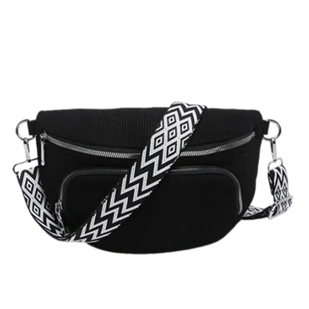 Corduroy chest bag with a wide black-and-white zigzag strap and multiple zip pockets