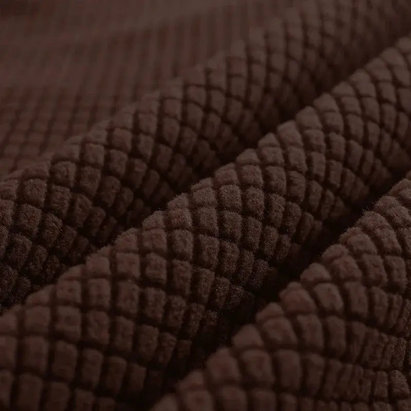 Bed head cover in dark brown polar fleece with a thick, textured quilted pattern and soft plush feel