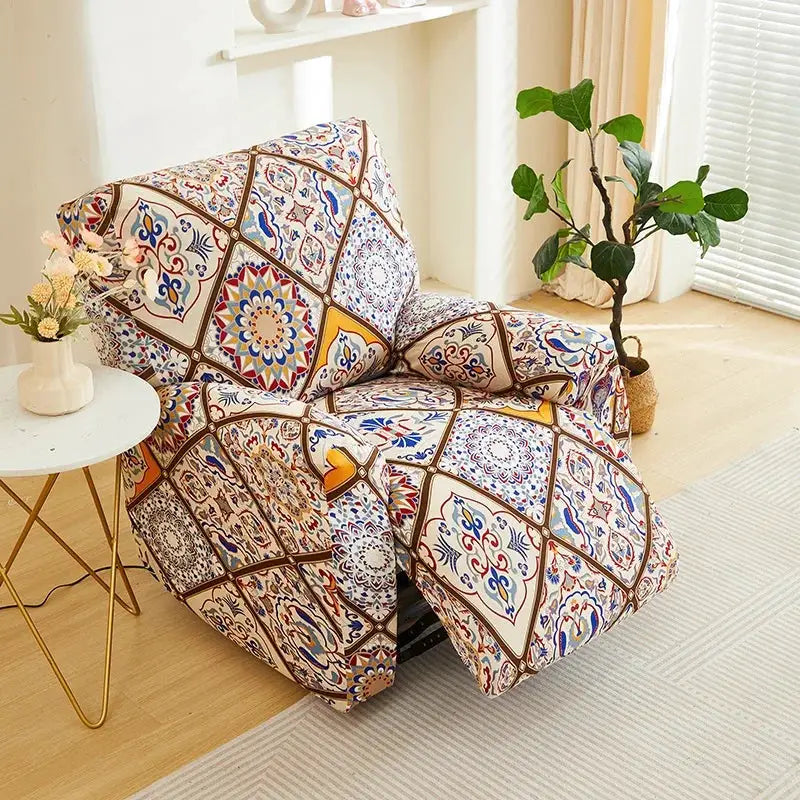 Elastic recliner sofa cover with colorful tile-patterned print on beige armchair.