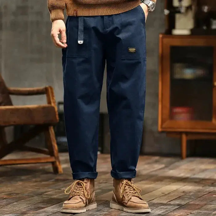 HIQOR men's loose cargo pants in navy with cargo pockets, drawstring waist, and rolled cuffs