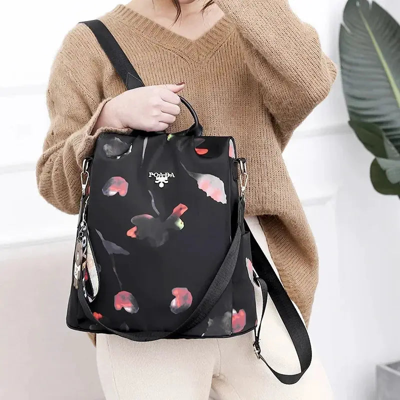 Simples Market women's Oxford cloth backpack, black floral print, large-capacity travel bag