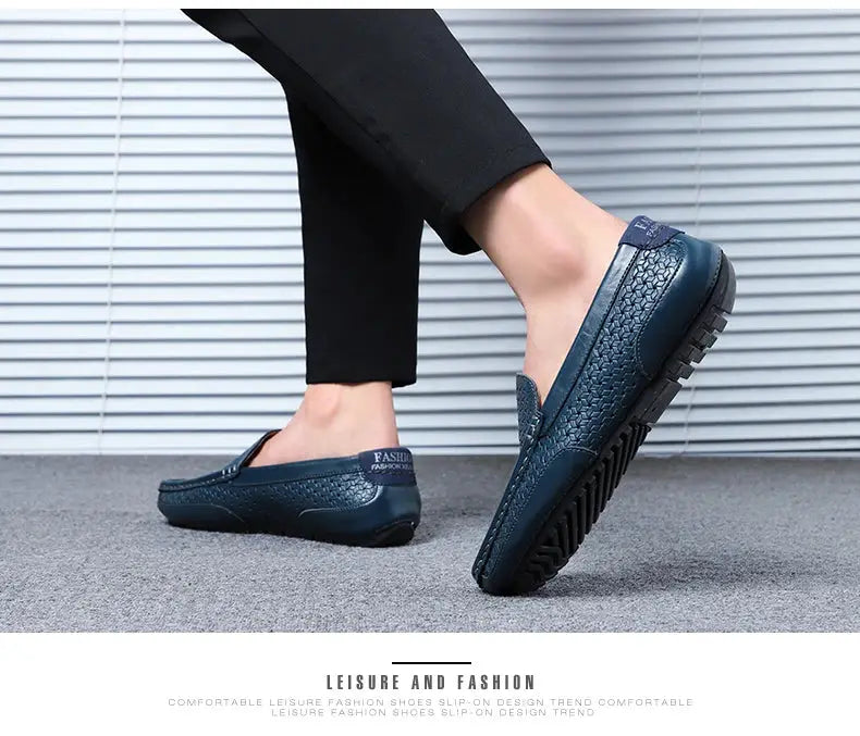 Pair of men's blue genuine-leather loafers with hollow-out perforations, breathable slip-on driving shoes