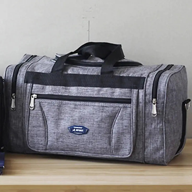 Simples Market Oxford waterproof grey travel duffel bag with black handles and front and side zip pockets