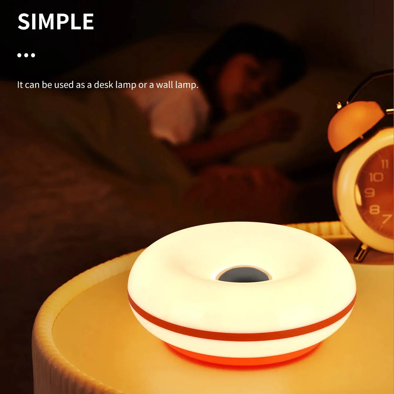 Bauhaus donut table lamp with USB plug by Simples Market; white with red accent.