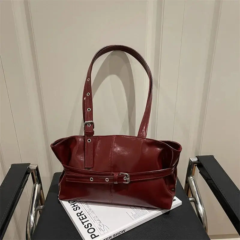 Belt-buckle handbag in red leather, Korean-style solid color, soft finish for women