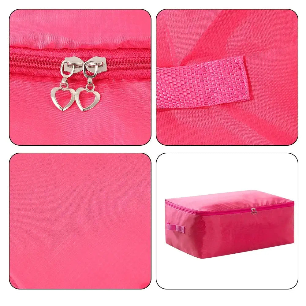 Large pink zipper clothes organizer bag by Simples Market for bedding storage