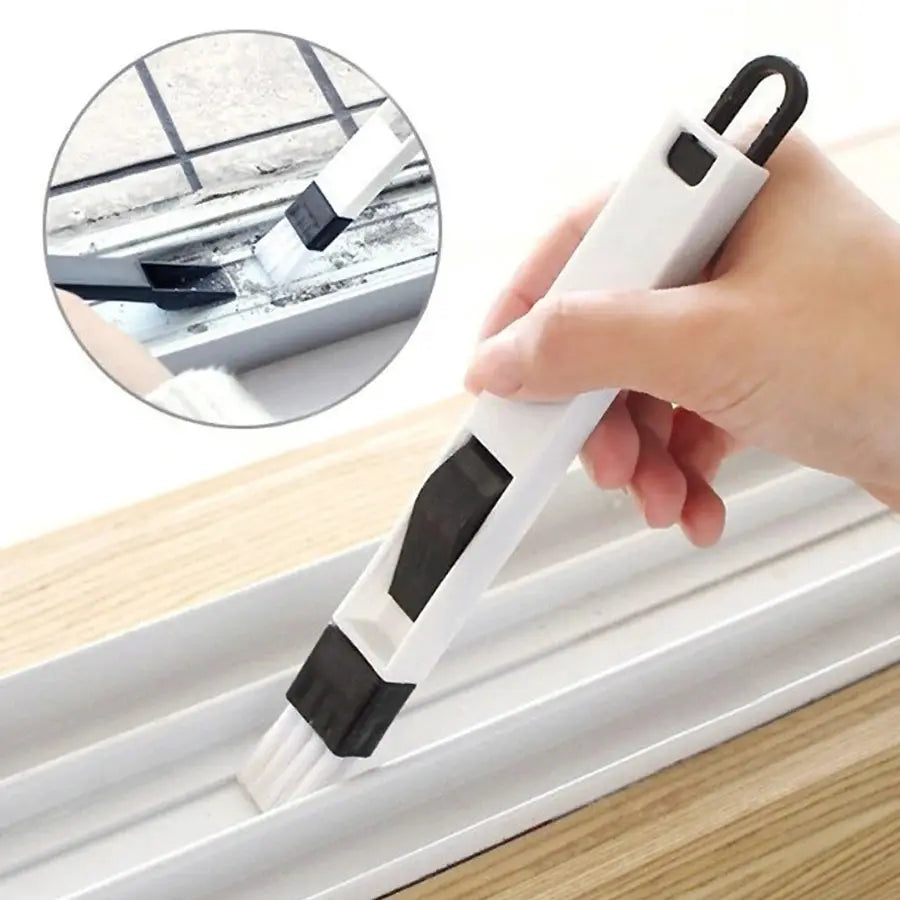 Simples Market portable two-in-one cleaning brush for door and window grooves, white plastic with black bristles.