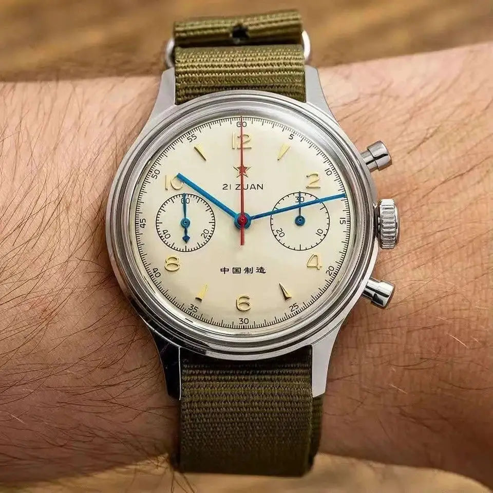 Red Star 38mm chronograph pilot watch on olive fabric strap; cream dial with blue hands, red seconds, and two subdials.