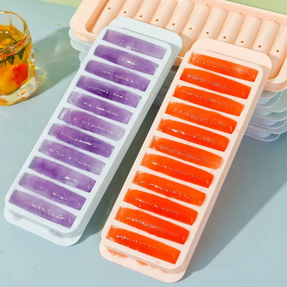 Two long-bar cylindrical ice cube molds in pastel colors with purple and orange ice bars