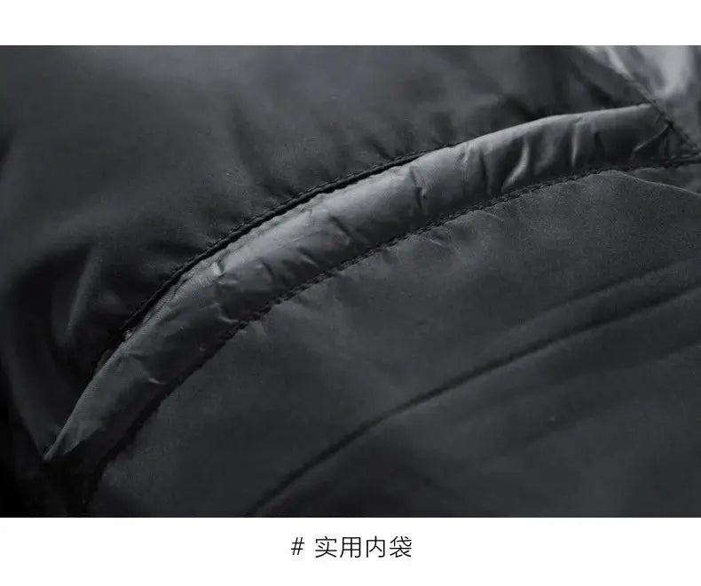 Winter Hooded Down Coat by Simples Market, black quilted fabric with inner pocket close-up