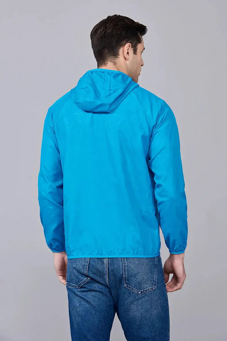 Unisex blue hooded hiking jacket; lightweight, waterproof windbreaker for outdoor trekking, camping, and rain protection