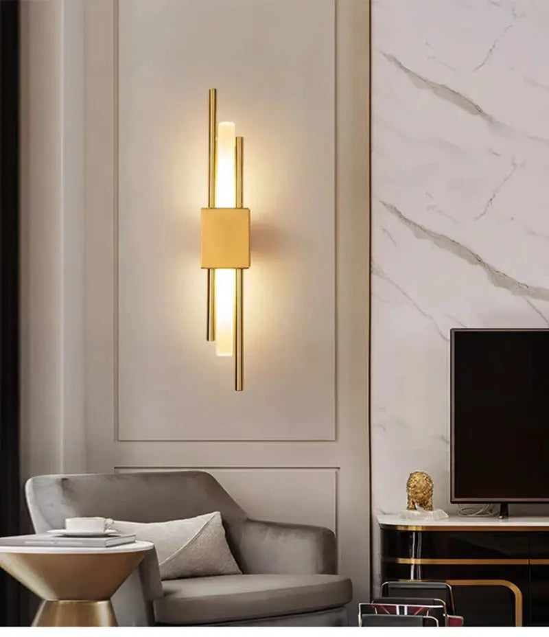 Nordic LED wall lamp with gold finish, vertical modern design for bedroom and living room by Simples Market