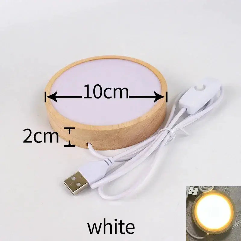 Round wooden LED night light base with white top, 10 cm diameter, 2 cm tall, USB powered
