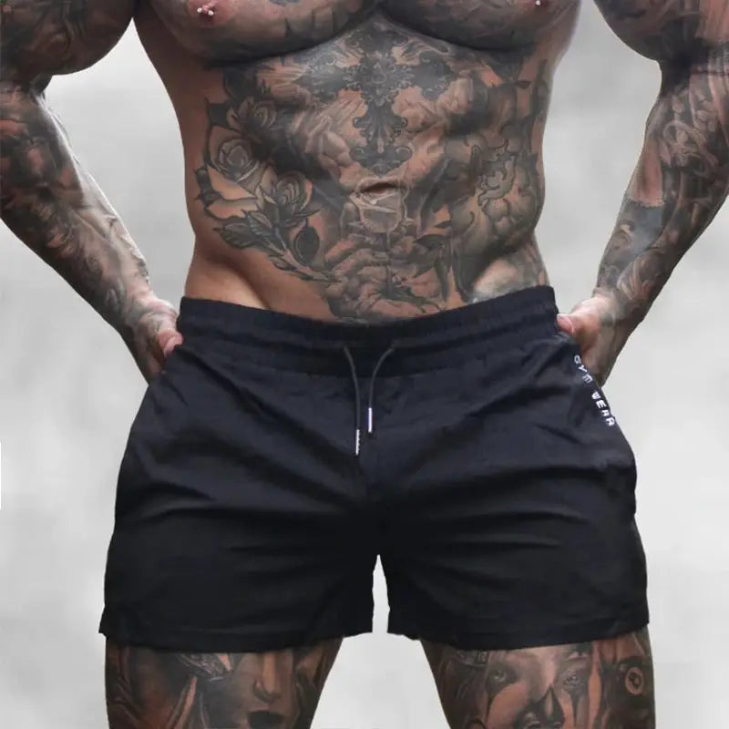 Men's black lightweight drawstring gym shorts; quick-drying fabric for running and squats.