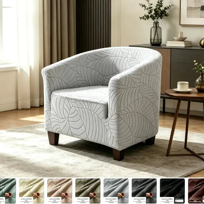Simples Market elastic club chair cover in light gray with leaves jacquard pattern.