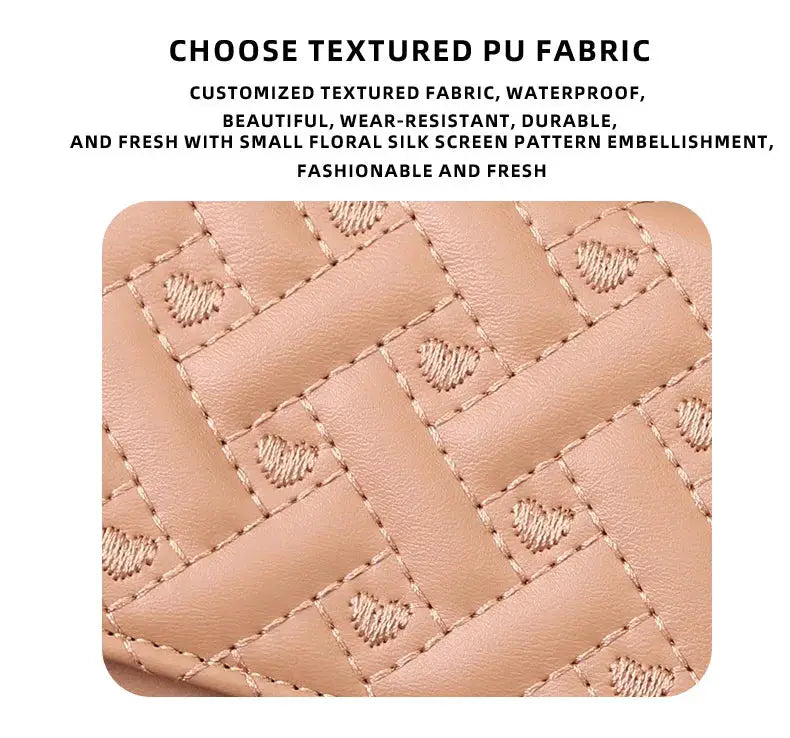 Women's short wallet in peach textured PU leather with quilted square embroidery pattern