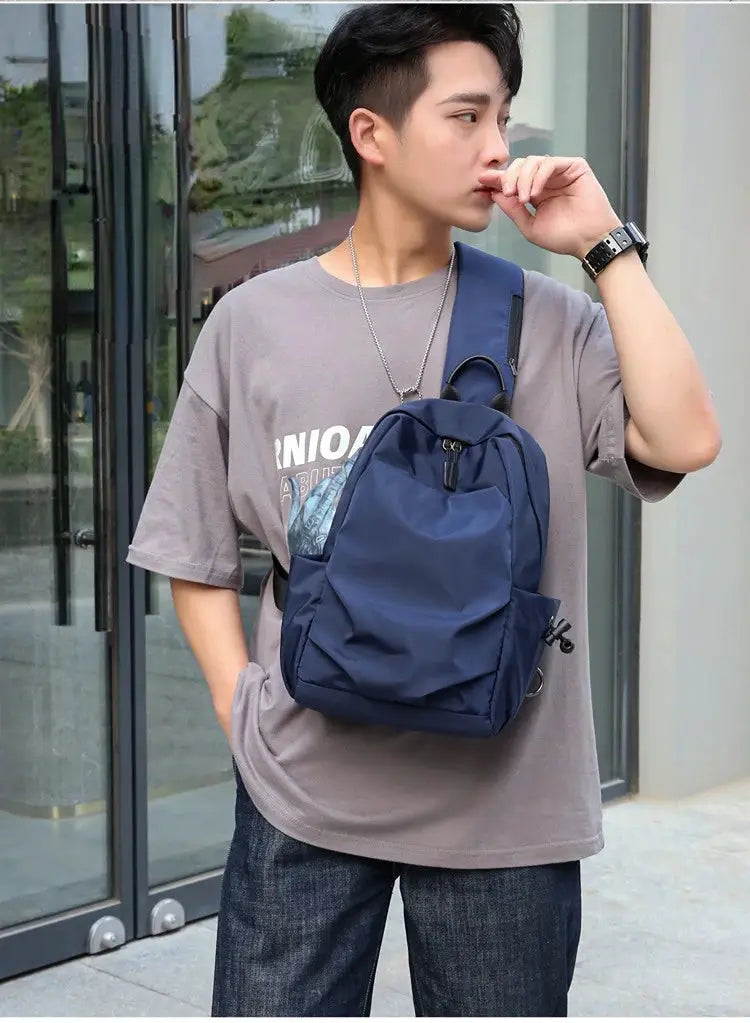 Men's navy canvas chest bag, large crossbody sling with front pocket and zip closure