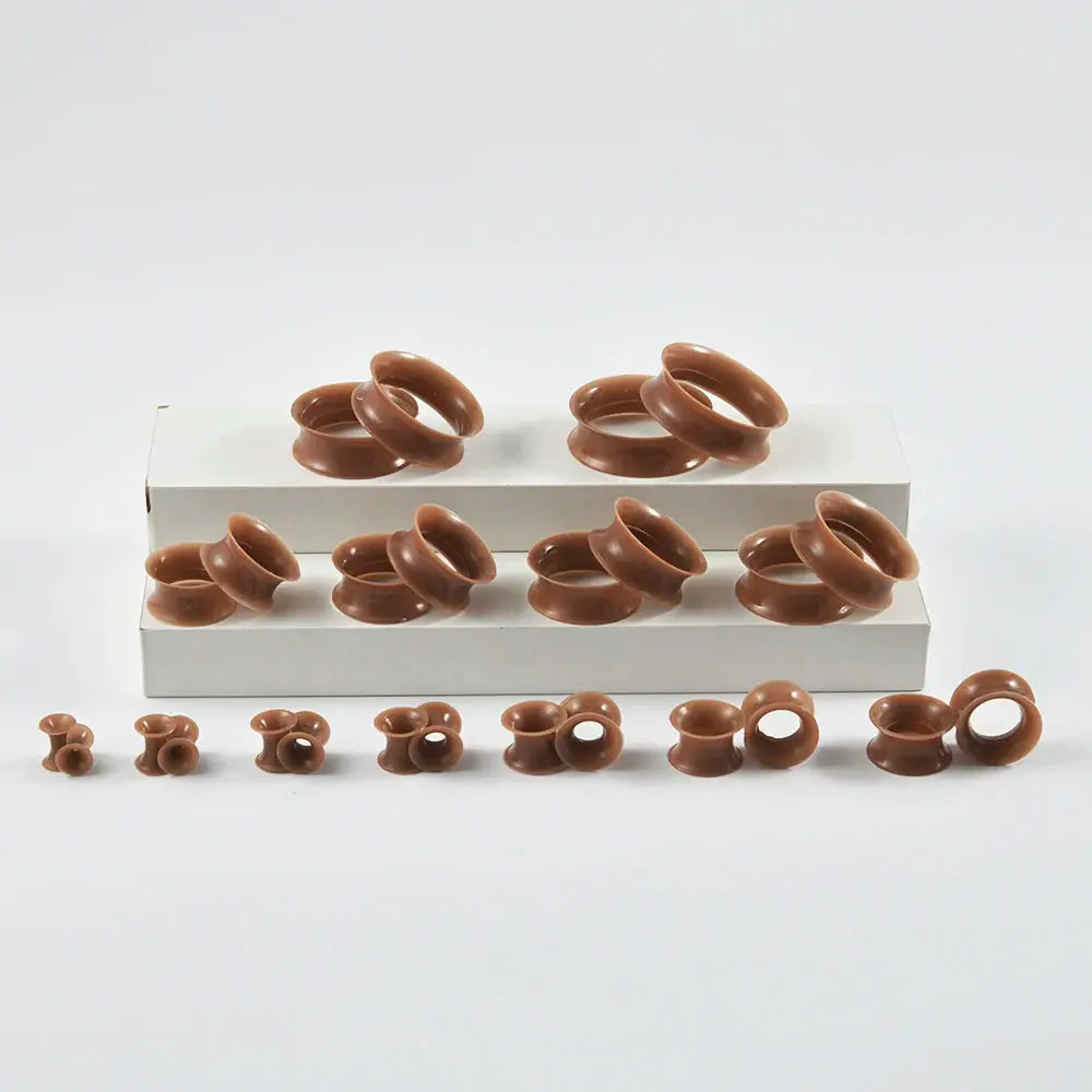 Skin-tone soft double-flare ear tunnels set from Simples Market