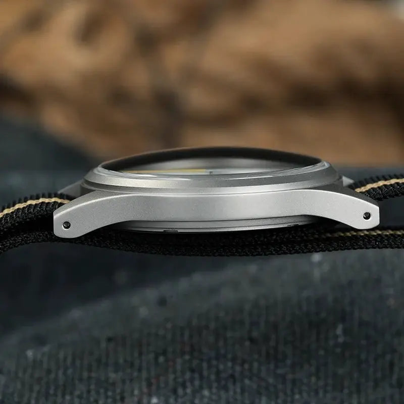 Militado ML07 quartz watch with silver-tone case and black fabric strap with beige stripe