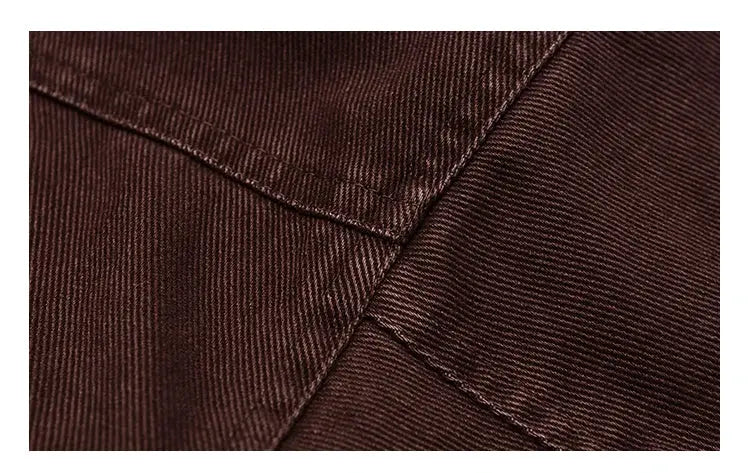Polar fleece jacket, brown fabric close-up with stitching, men's winter coat