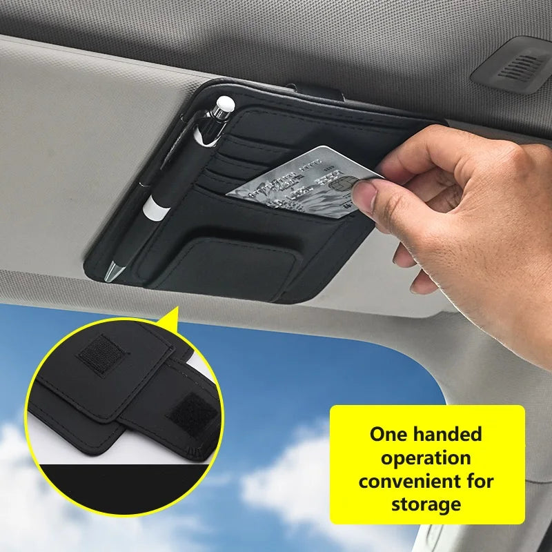 Black clip-on car sun visor organizer with card slots and pen holder