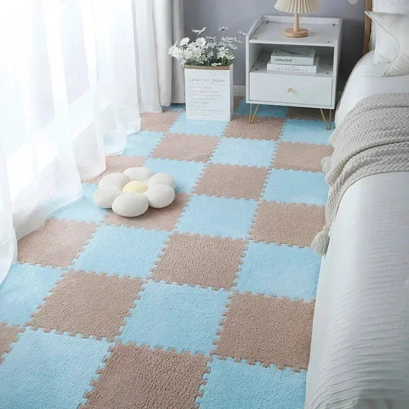 Soft plush EVA foam puzzle play mat by Simples Market; blue and beige interlocking 30 cm tiles