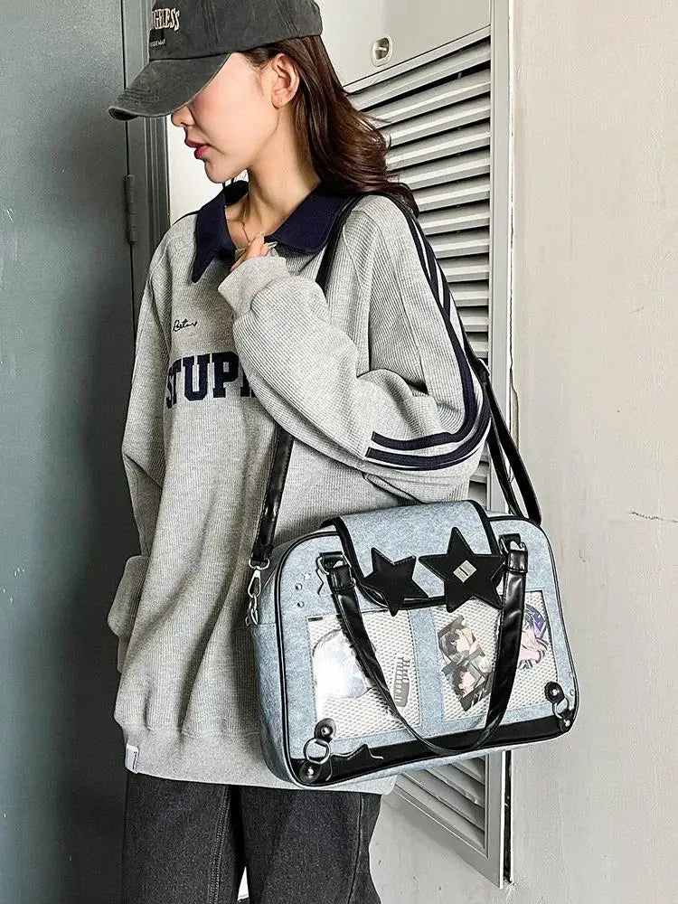 Y2K star ita bag crossbody in light denim with transparent pockets and black star accents