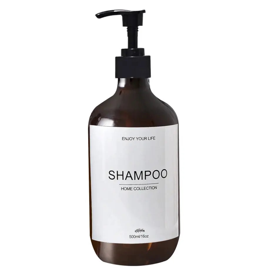 Shampoo dispenser bottle with amber color and black pump, 500ml capacity.