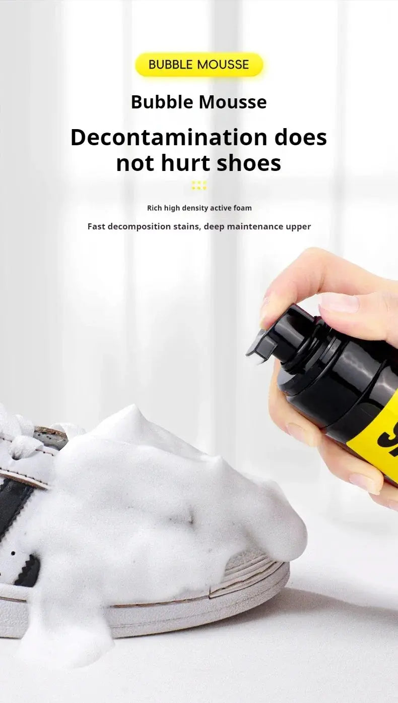 Shoe cleaner foam bottle applying water-free foam to a white sneaker