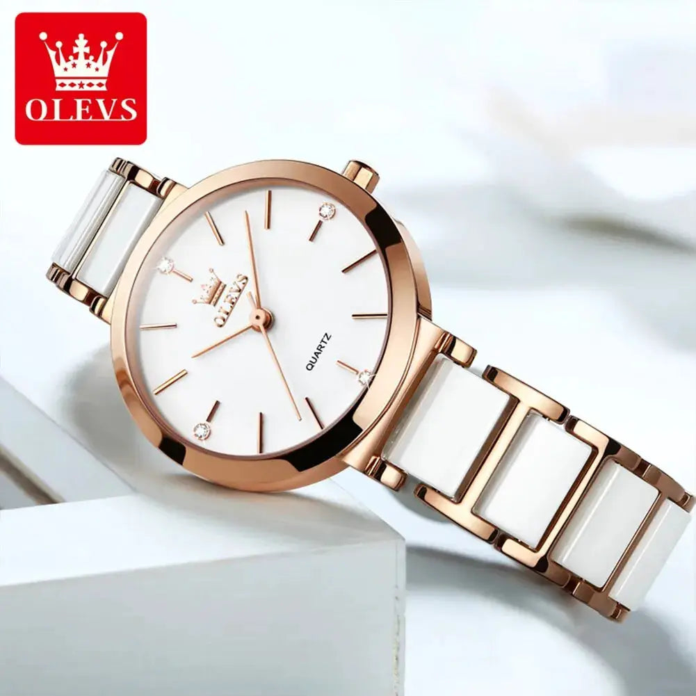 OLEVS women's rose-gold quartz watch with white dial and ceramic strap.