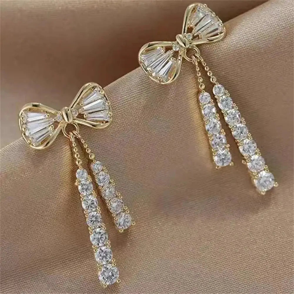 Fashion Bow Crystal Zircon Earrings, gold-tone pair with dangling crystal strands