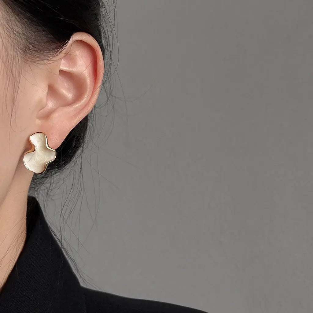 Artistic irregular cloud stud earring in white with gold-tone edge, Simples Market