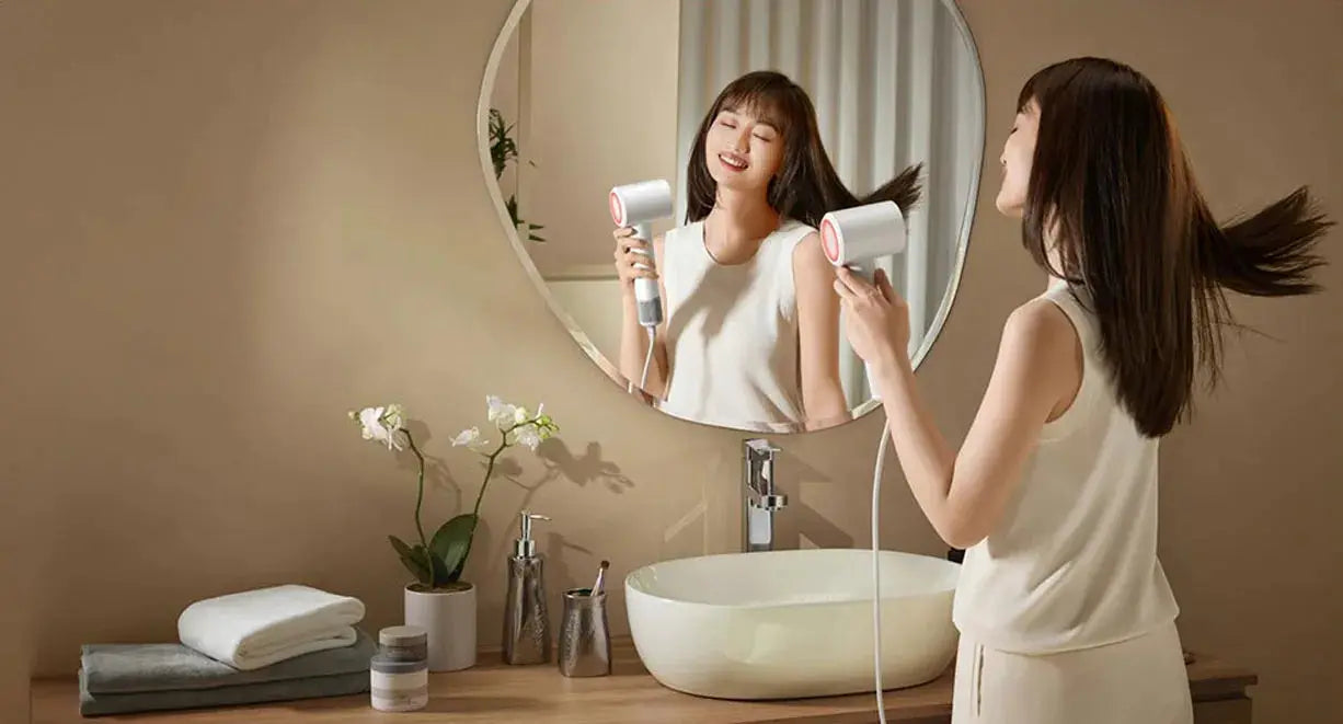 MIJIA H501 SE Hair Dryer by Simples Market; white with pink accents, CN version, two units shown in bathroom.