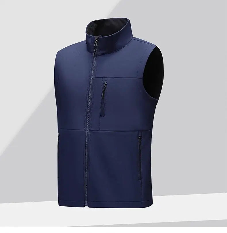 Men's navy soft-shell vest with full front zipper, chest and side zip pockets, high collar.