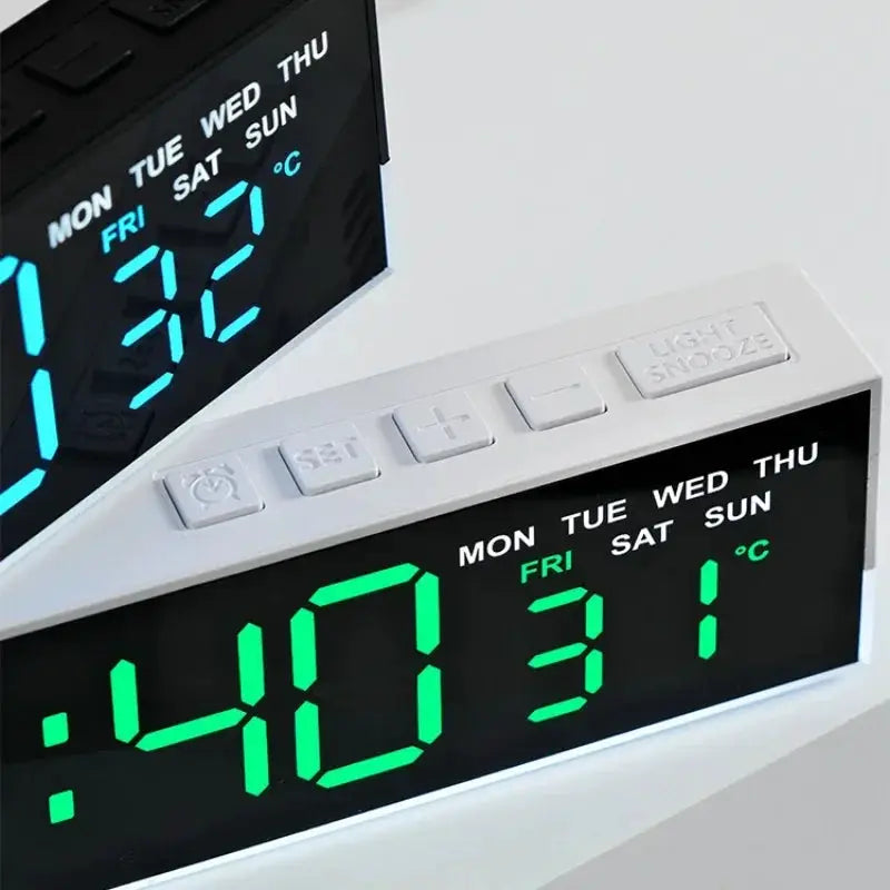 USB powered digital alarm clock with white housing and green LED display showing weekdays and temperature