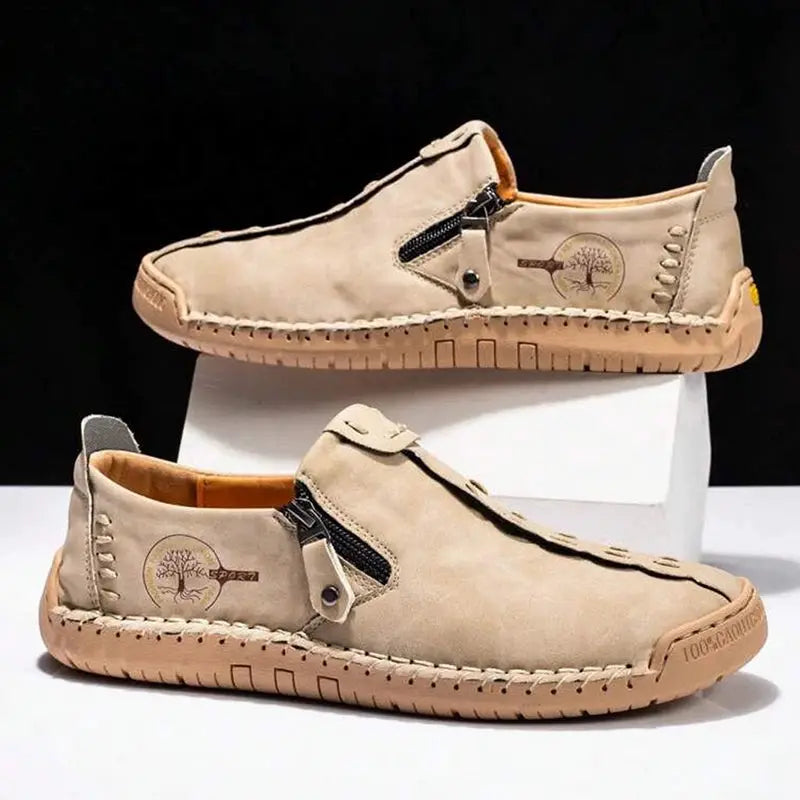 Handmade leather men’s slip-on loafers, tan with side zipper and moccasin stitching