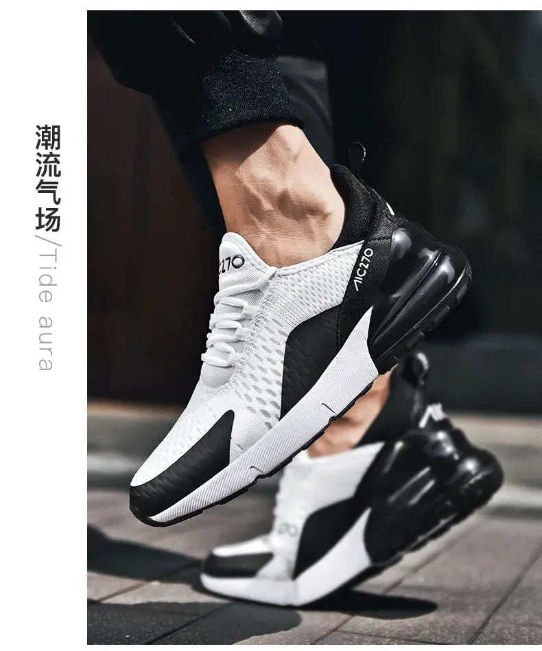 Pair of men's running sneakers in white mesh with black accents, breathable casual athletic shoes