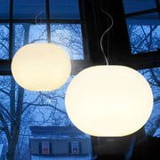 Two white glass ball pendant lights, Nordic Danish design by Simples Market