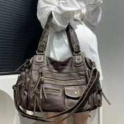 Simples Market Y2K hot girl crossbody bag in washed brown leather with multiple zip pockets and brass hardware